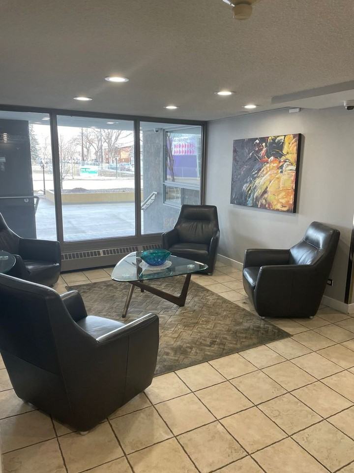 Two Bedroom 2 Bathroom Condo with Den Located in Downtown Edmonton! One Heated Underground Parking Stall! - Photo 2 of 29