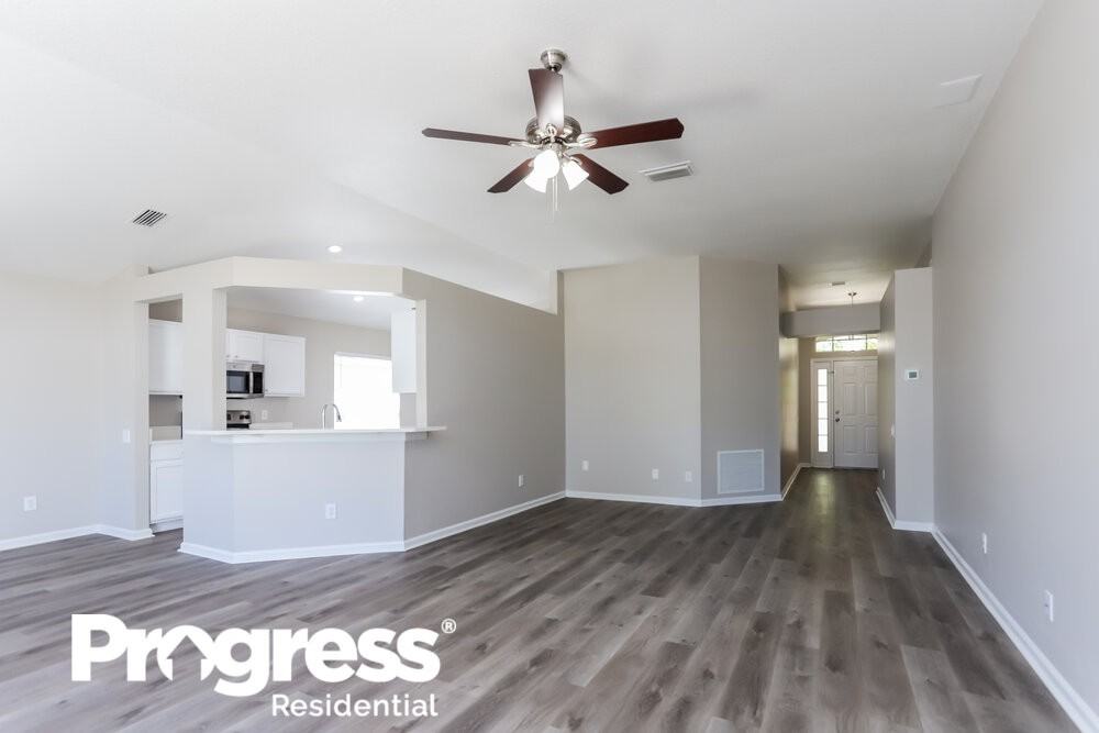 12328 Hawkeye Point Pl - Photo 3 of 16