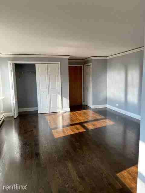 5031 N East River Rd #1B - Photo 3 of 9