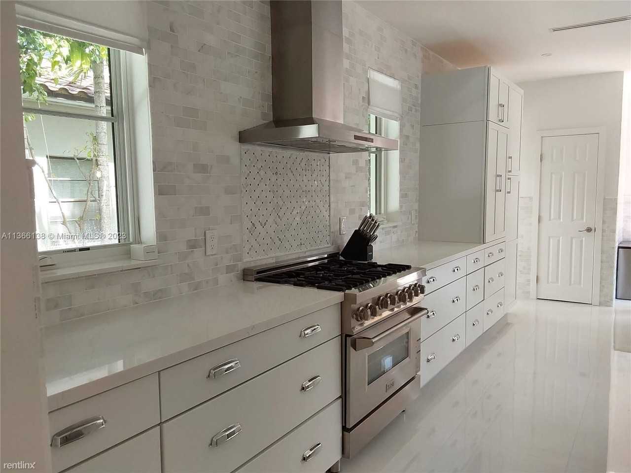 5660 Pine Tree Dr - Photo 3 of 12