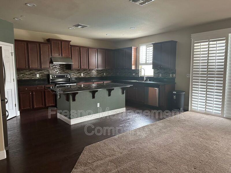 7197 E Vassar Ave - Photo 2 of 9