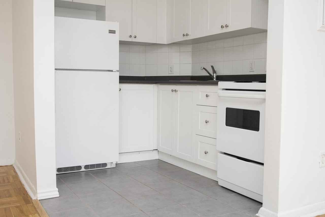 1594 Victoria Park Ave - Photo 3 of 5