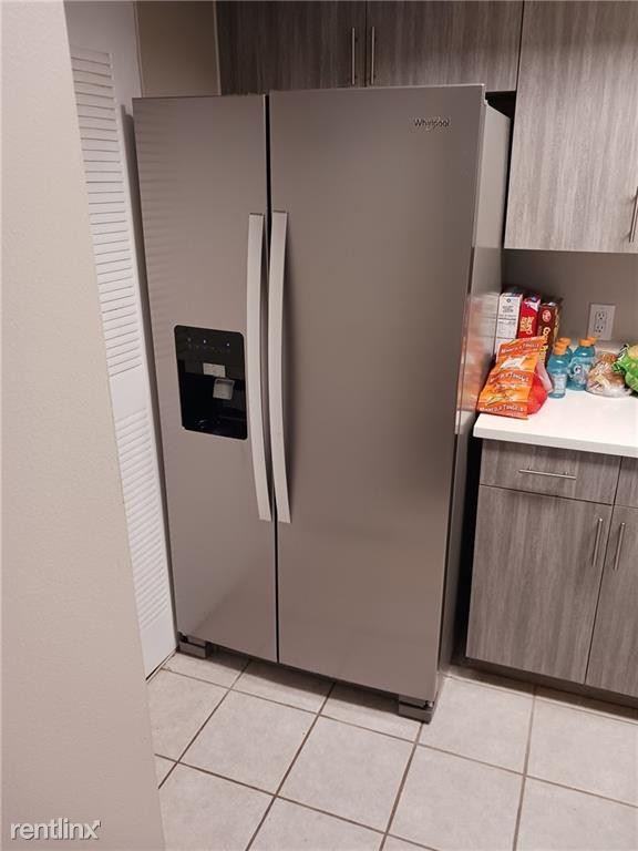 5065 Wiles Rd - Photo 3 of 9