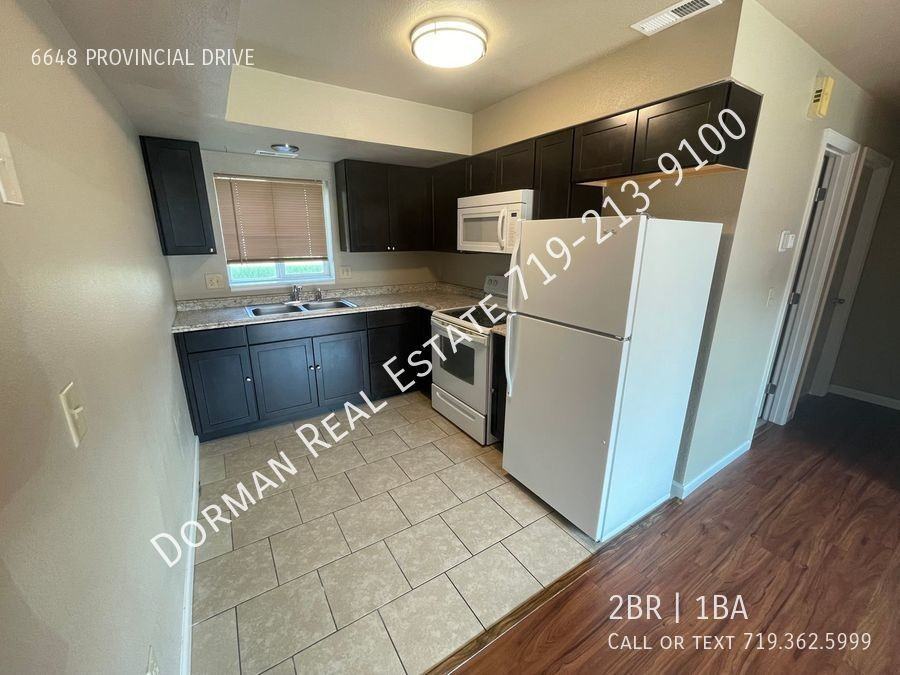 6648 Provincial Dr - Photo 2 of 7