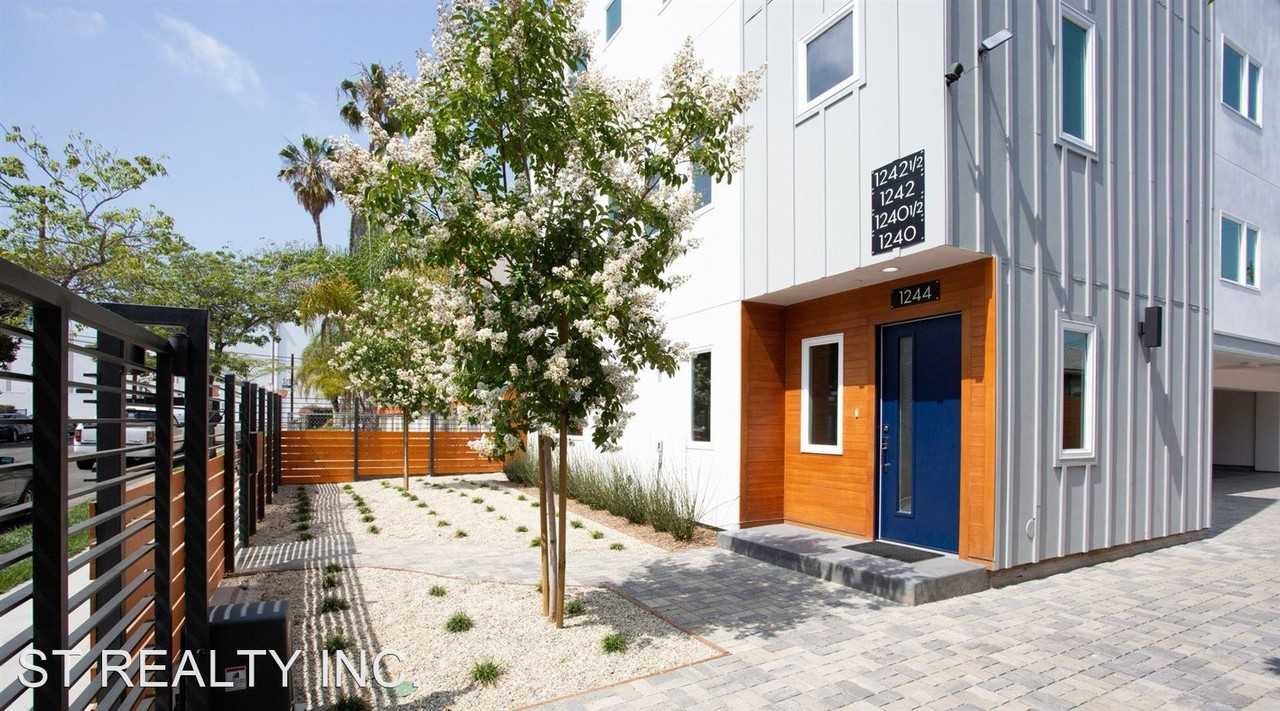 Come home to these Modern Townhomes in Hollywood! - Photo 3 of 29