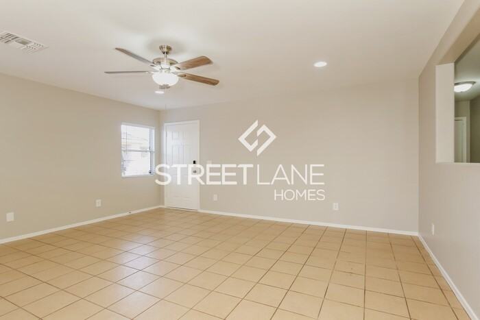 12409 W Surrey Ave - Photo 2 of 14