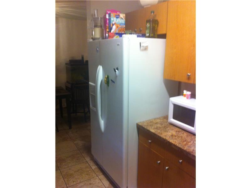 1620 NW 11th Pl - Photo 3 of 6