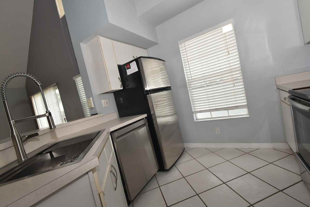 9320 Lake Chase Island Way - Photo 3 of 15