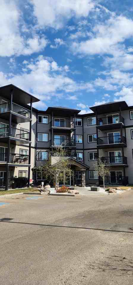 Spacious & Bright 2 bed 2 bath ground floor condo*Underground Stall*Gym