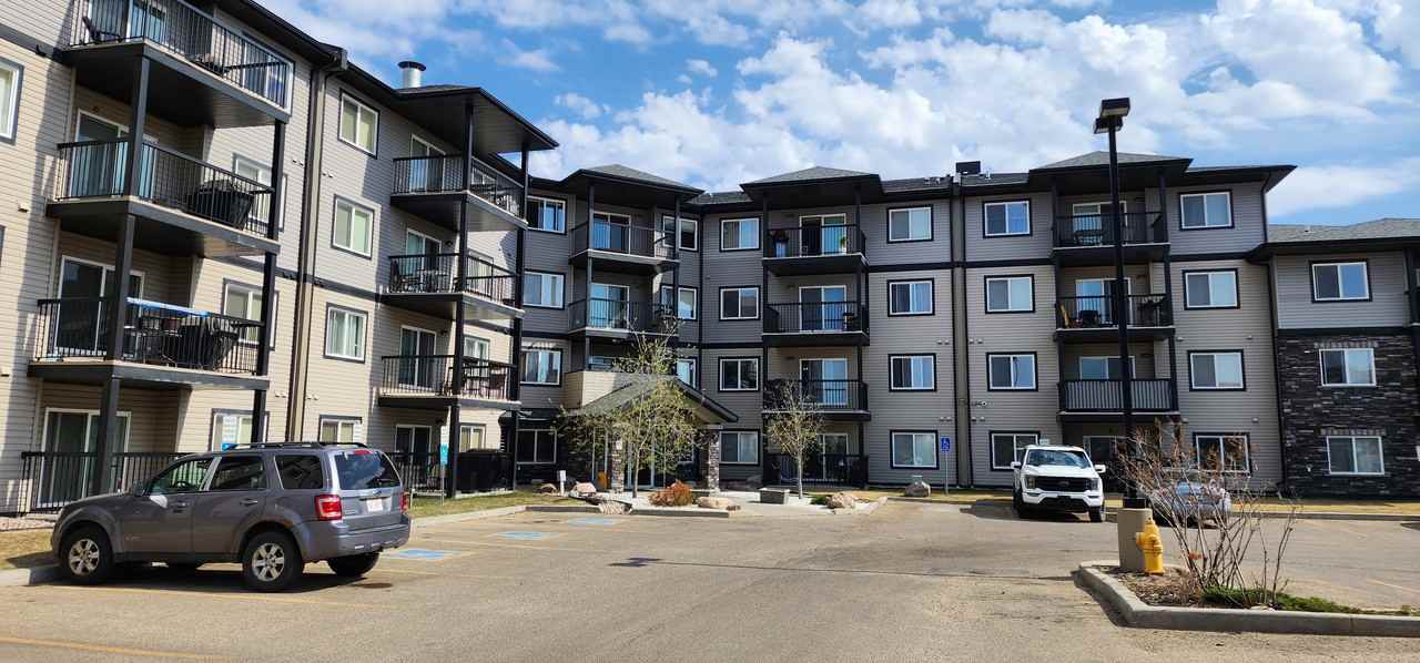 Spacious & Bright 2 bed 2 bath ground floor condo*Underground Stall*Gym