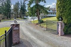 Expansive 3 level private gated home sits on +/-4.94 acres with a pond and beautiful view of Mount R - Photo 1 of 1