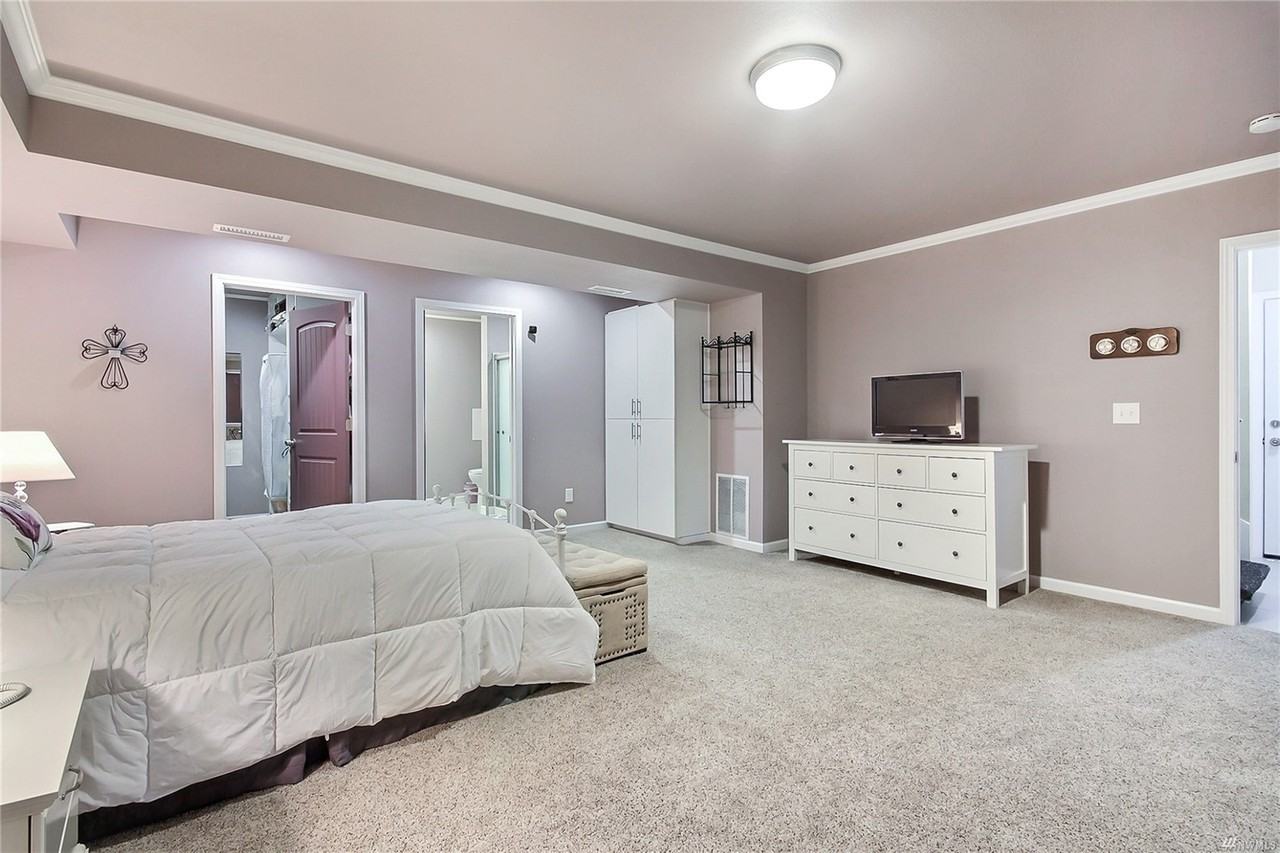 Expansive 3 level private gated home sits on +/-4.94 acres with a pond and beautiful view of Mount R - Photo 7 of 9