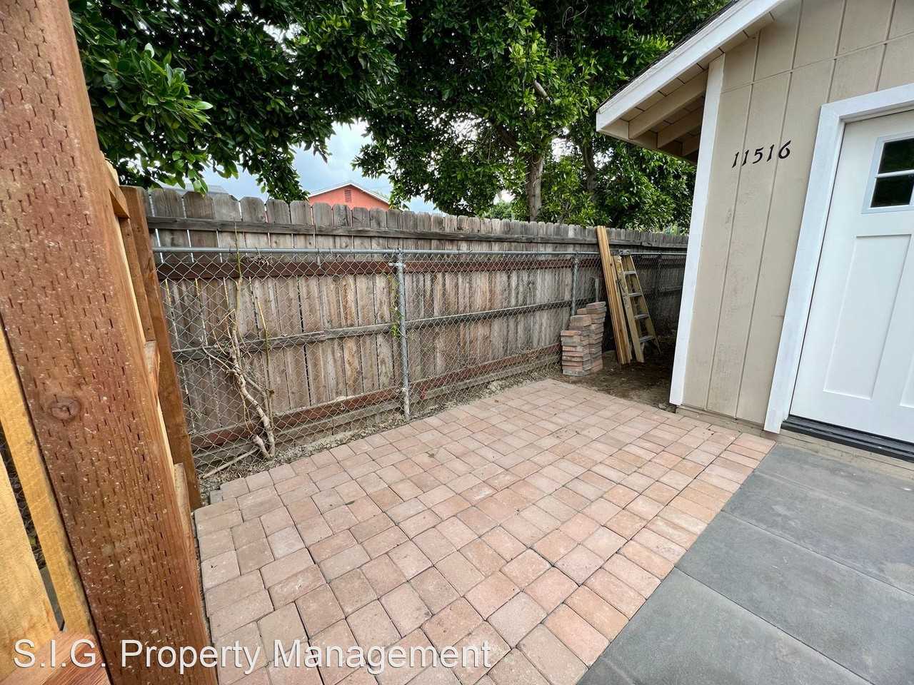 11516 Kelowna St - Photo 3 of 22