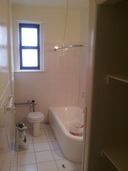 Neptune Ave - Photo 3 of 4