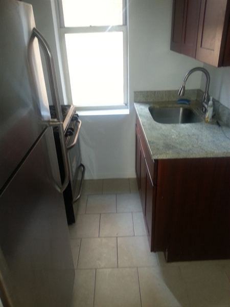 Ave V - Photo 3 of 4