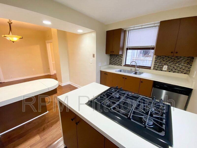 7009 Blackhawk St - Photo 2 of 12