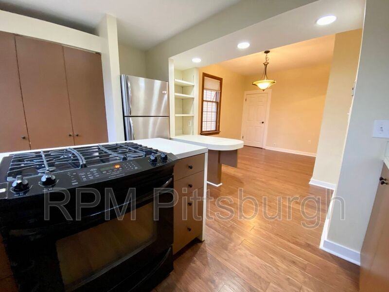 7009 Blackhawk St - Photo 3 of 12