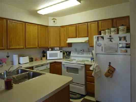 Whispering Winds Townhomes - Photo 3 of 12