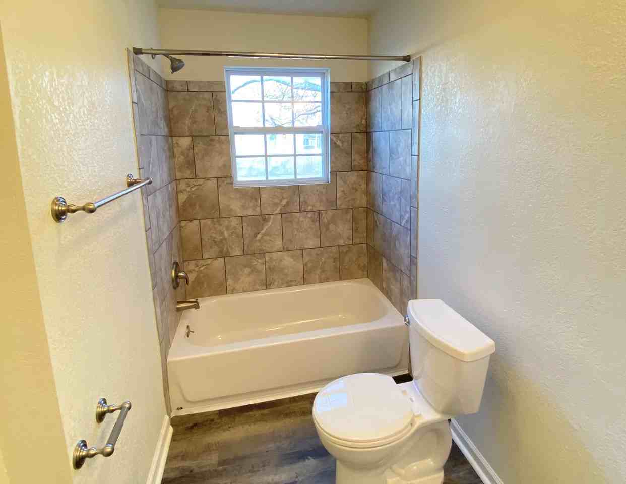 Poplar Place - Photo 3 of 4