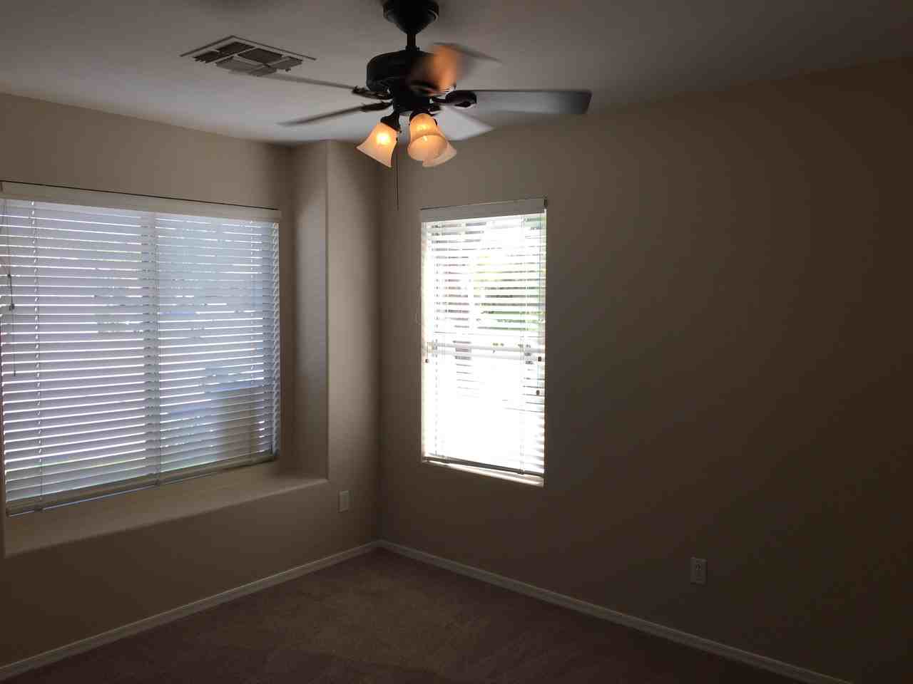 9323 W Harmony Ln - Photo 7 of 17