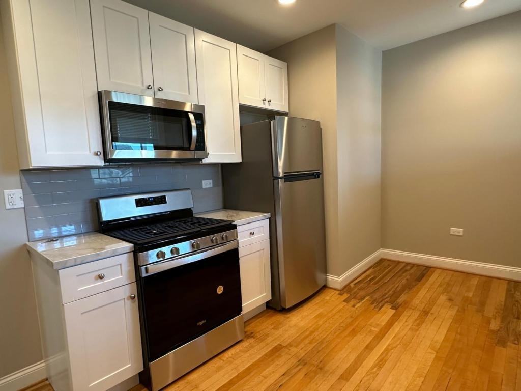6556 S California Ave Apt 2 - Photo 2 of 11