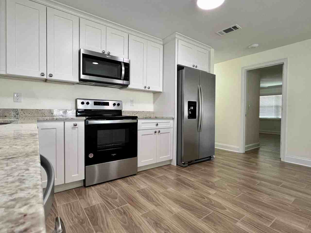 7510 Blossom Ave - Photo 3 of 27