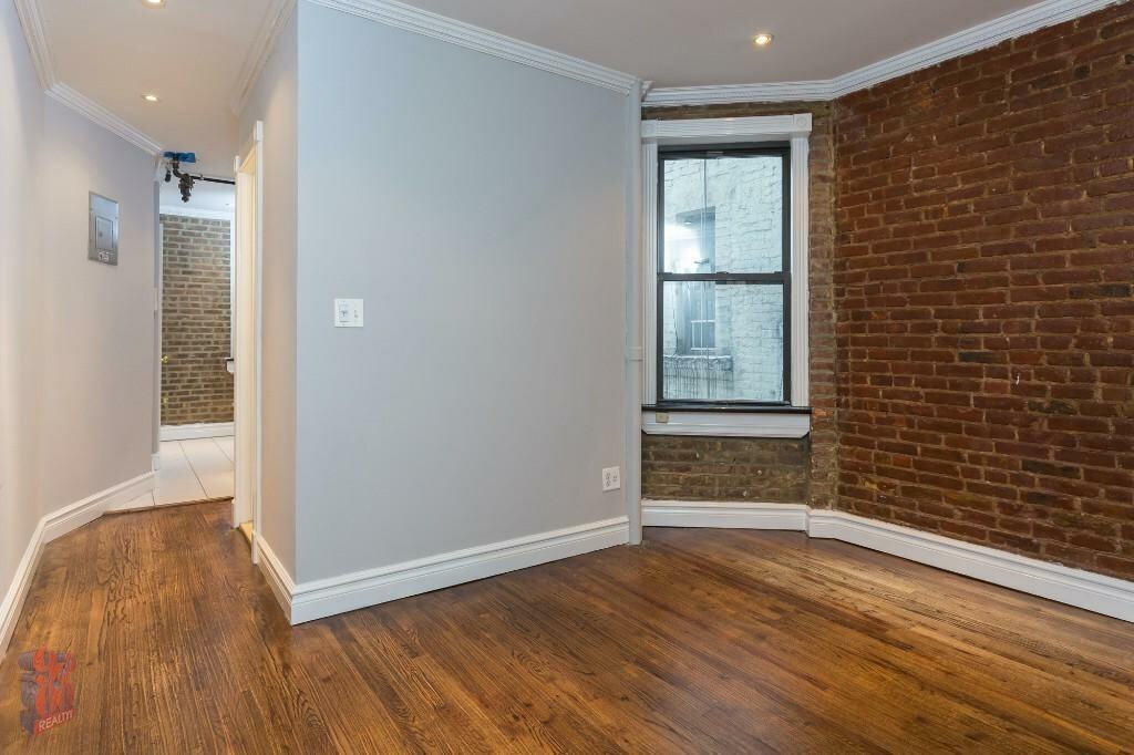 E 23rd St #16 - Photo 2 of 8