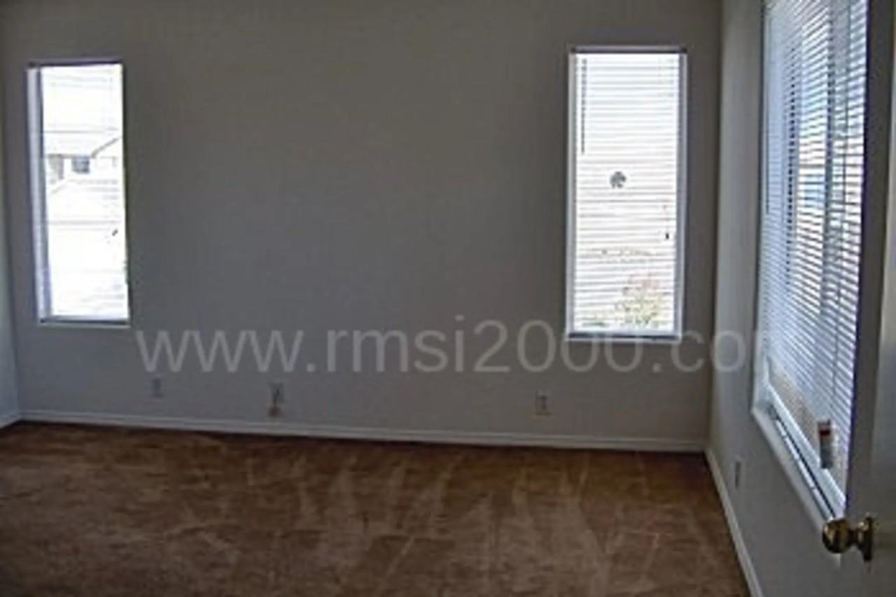 10819 Slumber Ct Nw - Photo 3 of 8