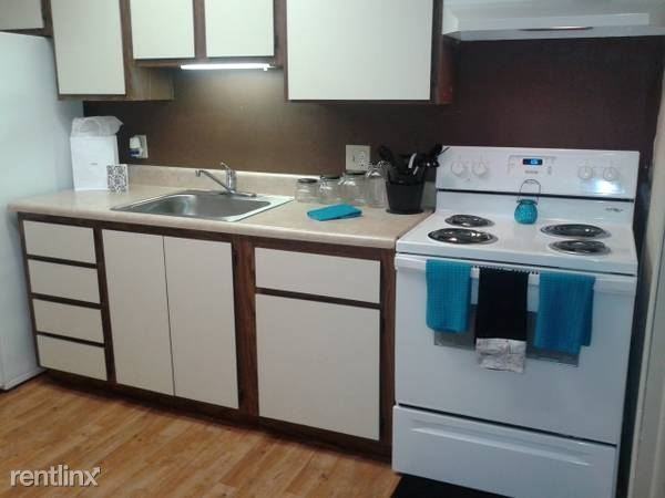 Oakwood Village Apartments - Photo 2 of 12