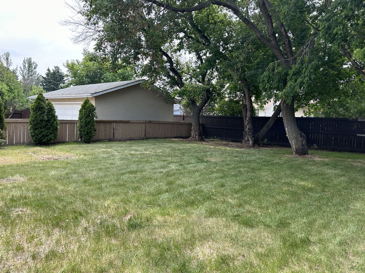 Updated 2 bed 1 bath main floor*Fenced yard w/Deck*In - Photo 2 of 37