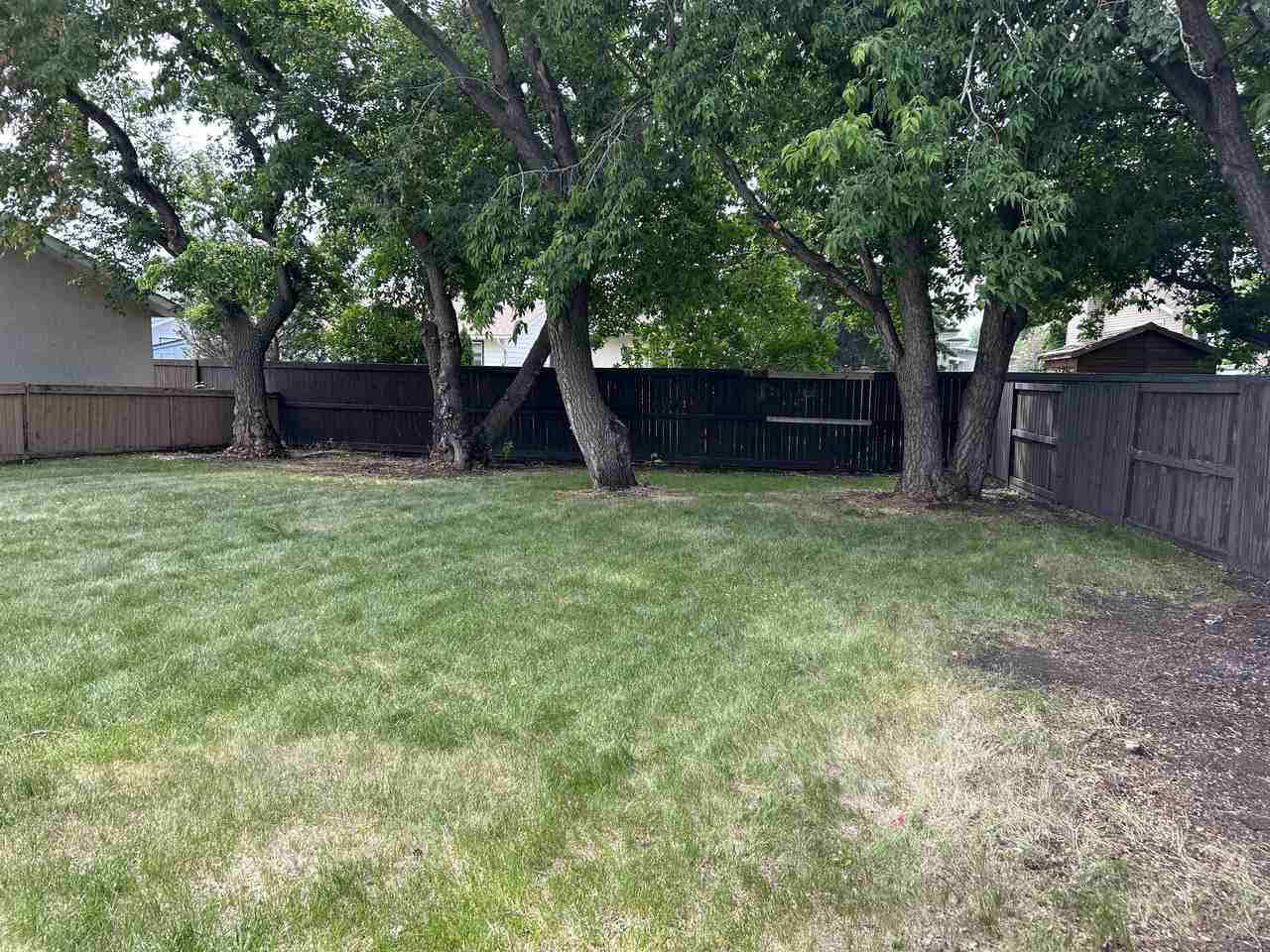 Updated 2 bed 1 bath main floor*Fenced yard w/Deck*In - Photo 3 of 37