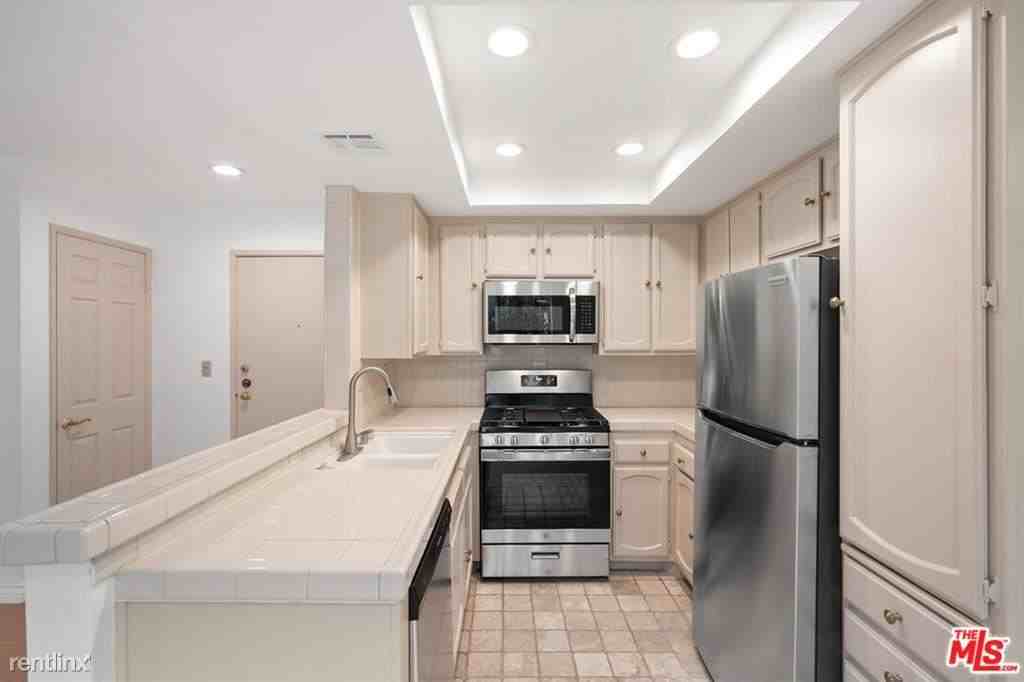 839 S Holt Ave #104 - Photo 3 of 10