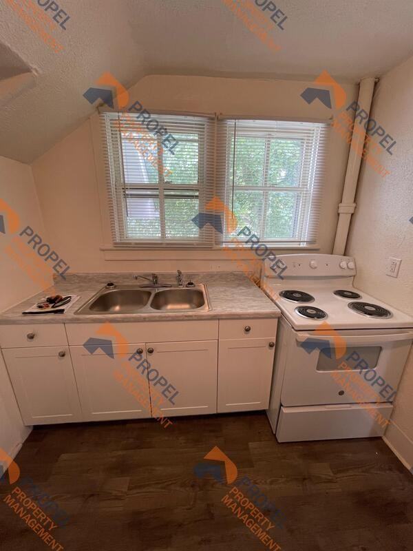 411 W 3rd St - Photo 5 of 8