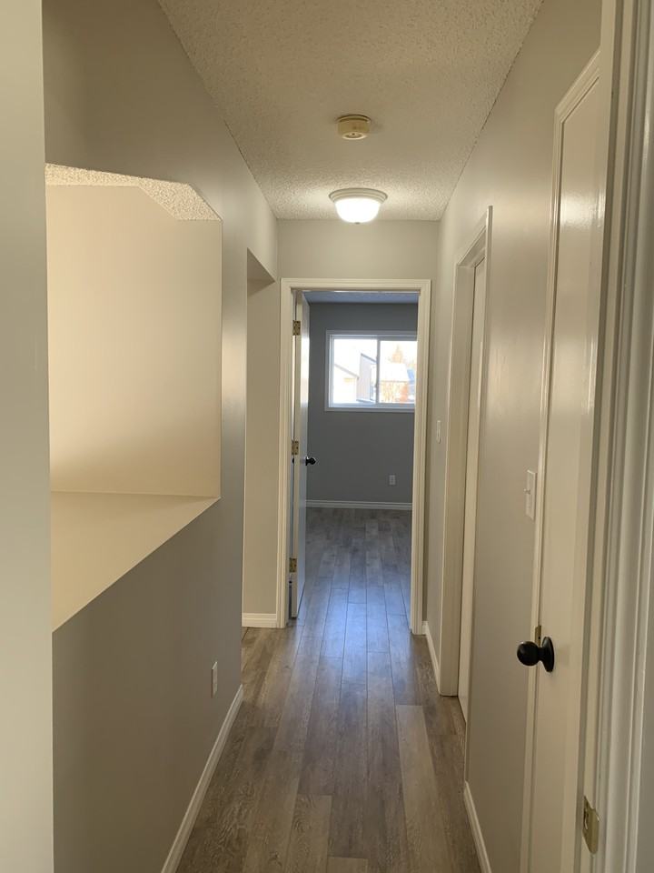 Updated 3 Bed 2 bath Family home*Fenced yard w/Deck*Double Garage*Shed* - Photo 3 of 46