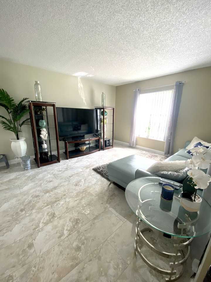 3871 Cocoplum Cir #15 - Photo 3 of 7