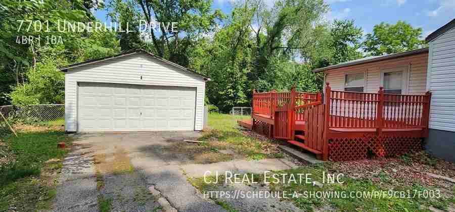 7701 Underhill Dr - Photo 2 of 11