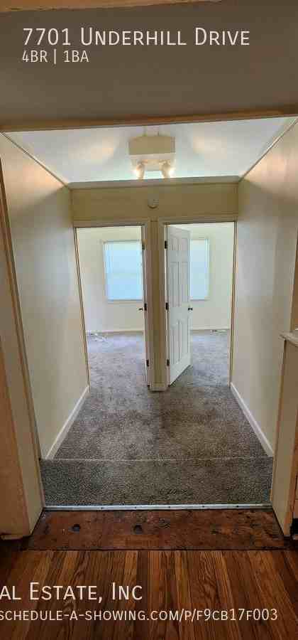 7701 Underhill Dr - Photo 4 of 11