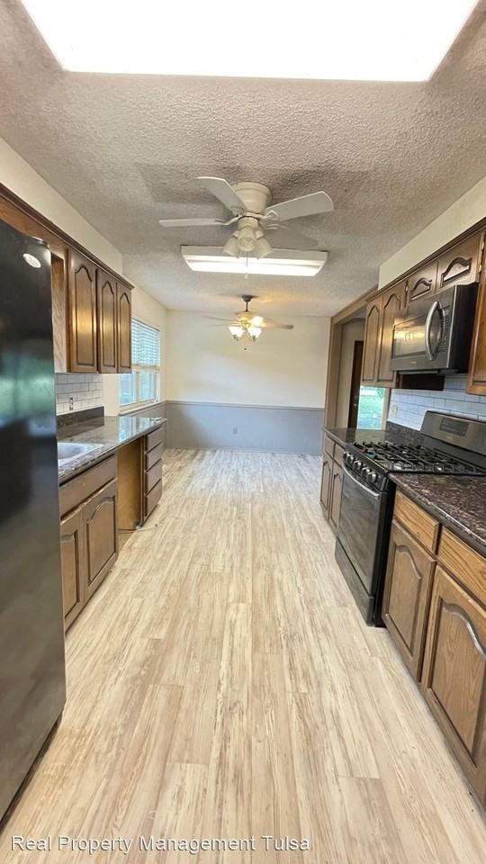 10202 S 200th East Ave - Photo 3 of 14