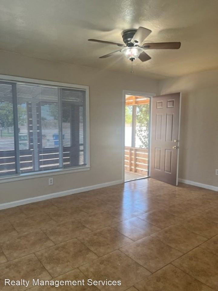 6211 & 6213 Rogers St - Photo 2 of 8