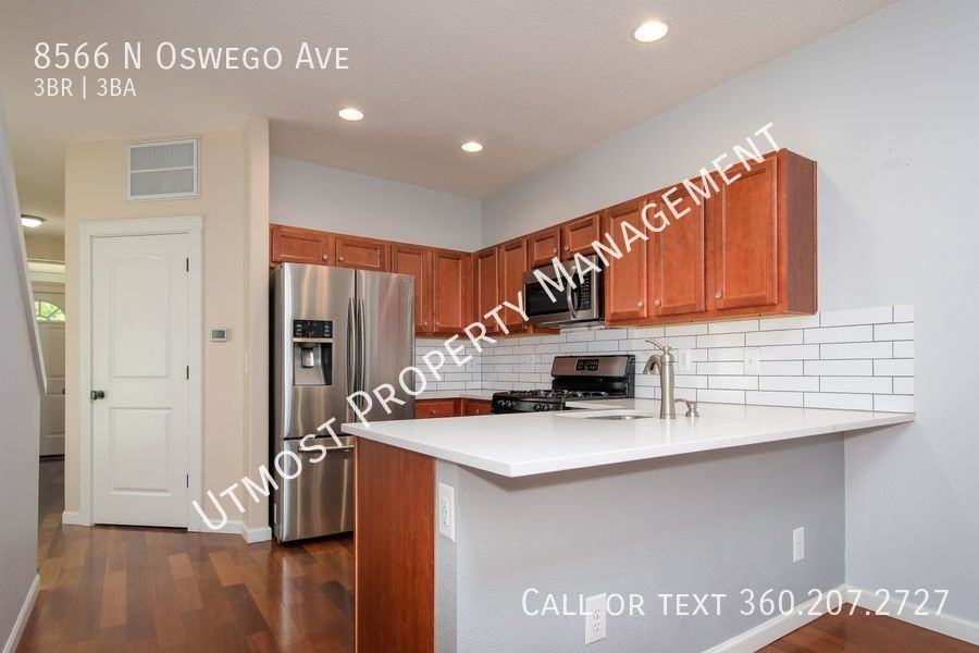 8566 N Oswego Ave - Photo 3 of 11