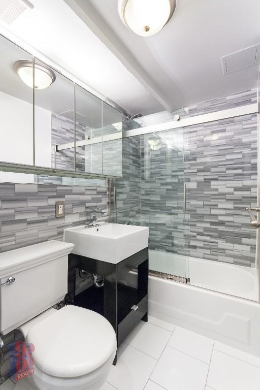 E 6th St #2 - Photo 2 of 3