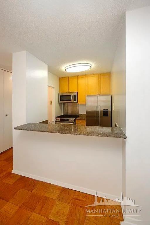 E 34th St #2010 - Photo 2 of 14