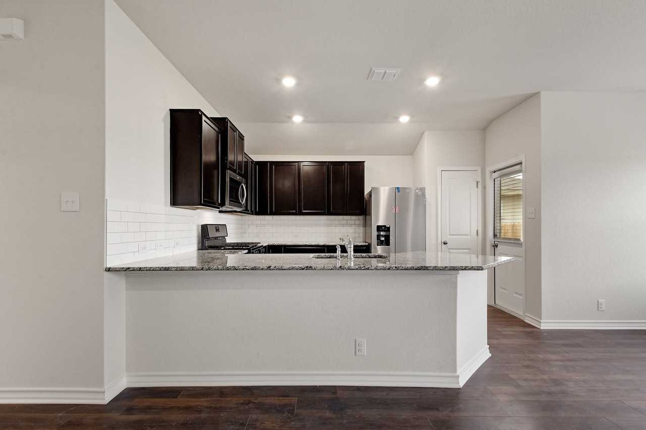 9959 Bratten Rise - Photo 6 of 26