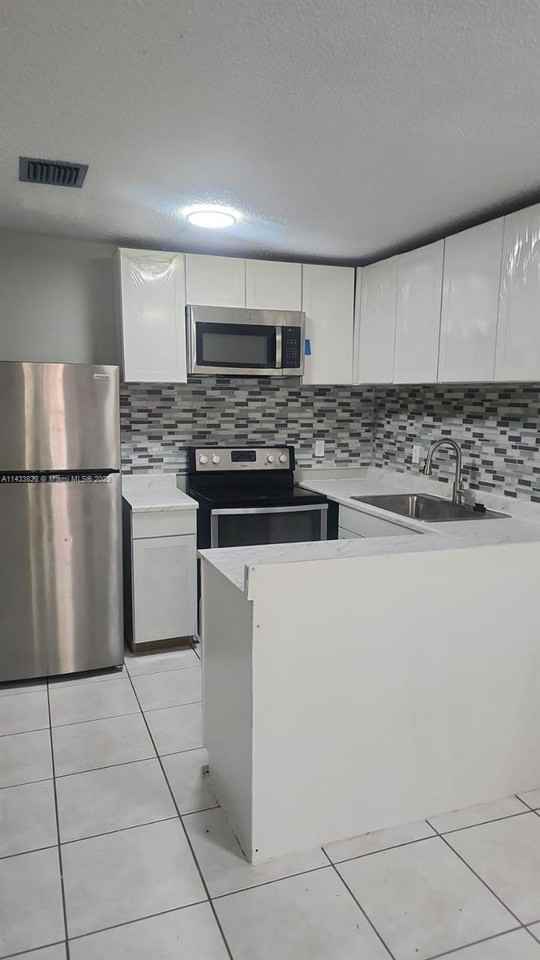 11544 Nw 44th St - Photo 2 of 8