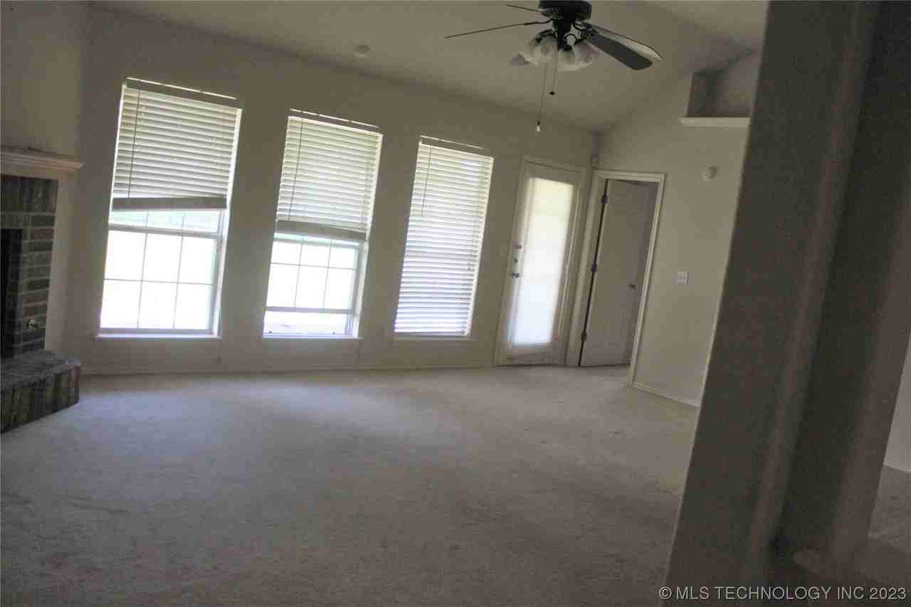 11214 E 122nd Ct N - Photo 3 of 13