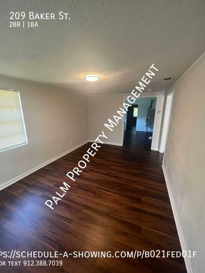 209 Baker St - Photo 2 of 15