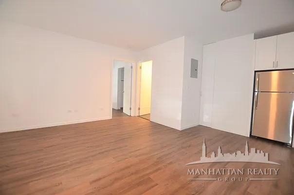 E 38th St #405 - Photo 2 of 5