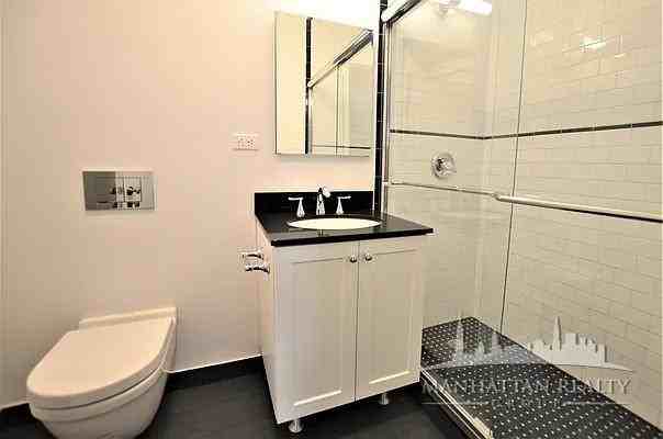 E 38th St #405 - Photo 3 of 5