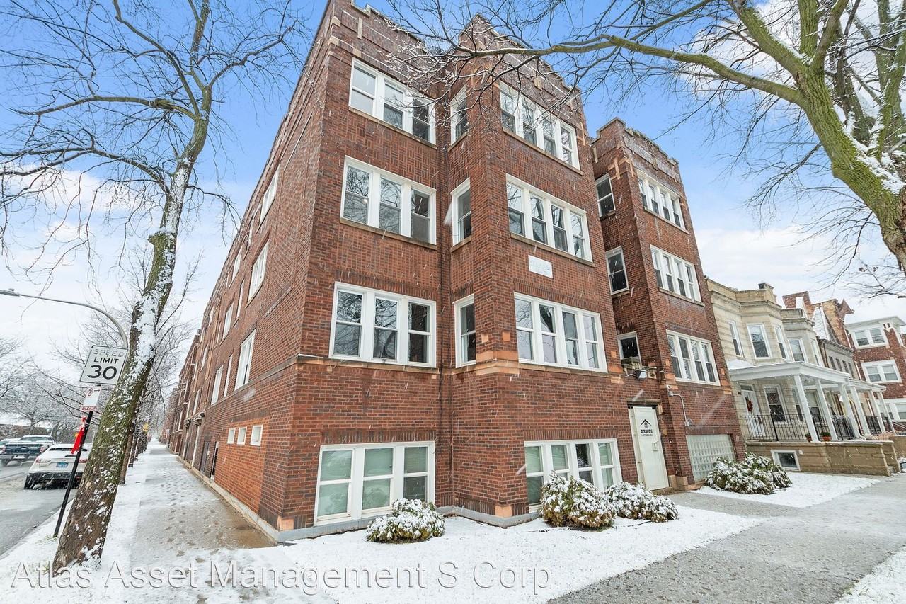 6656 - 6658 S Woodlawn Ave 1152 - 1156 E 67th St - Photo 2 of 9