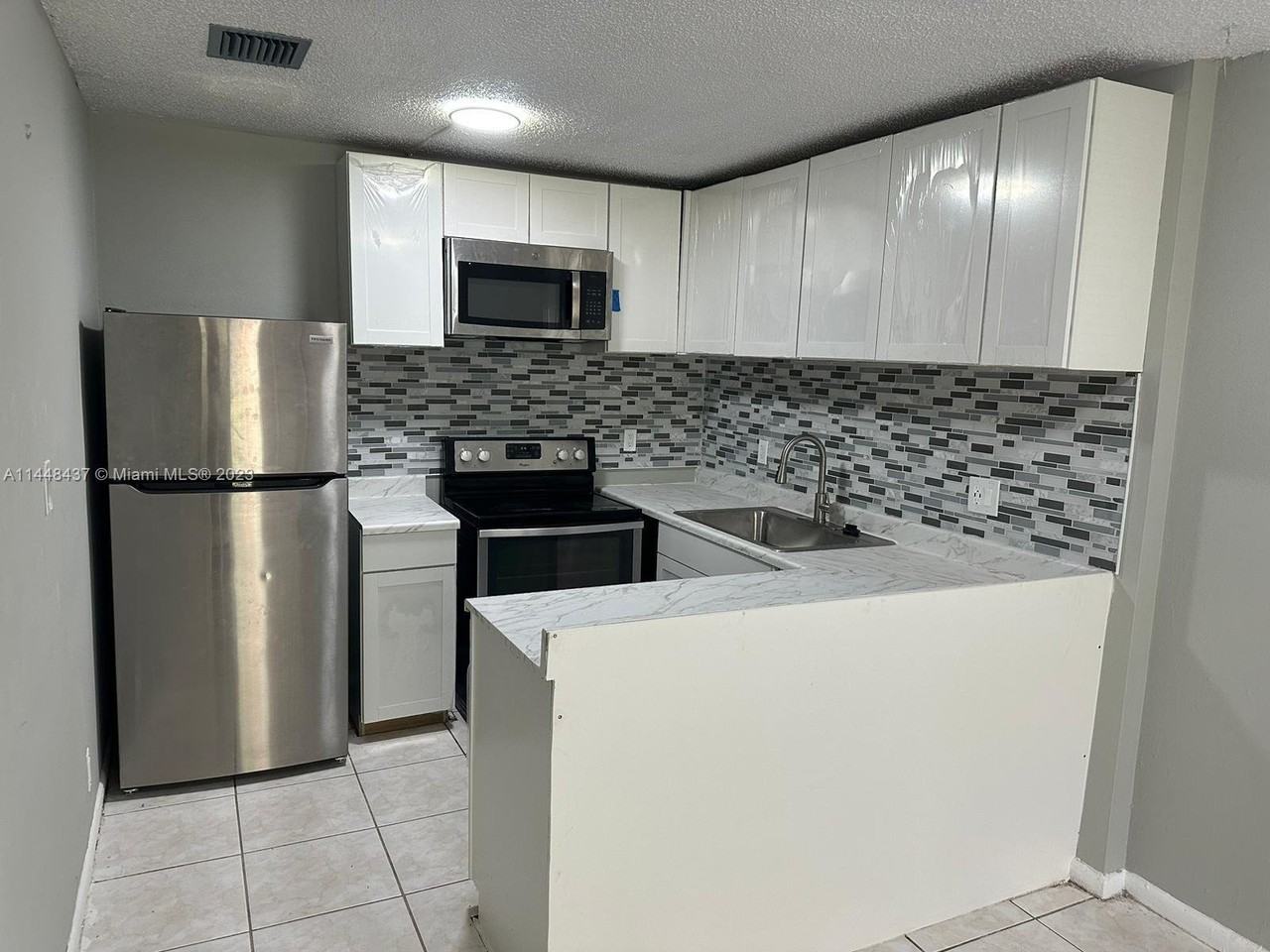 11542 Nw 44th St - Photo 3 of 8